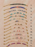 Armband 'charm beads'  goud